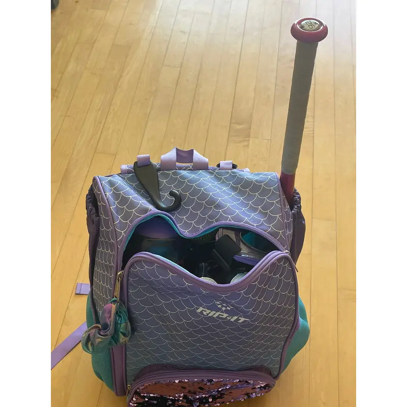 Lightly used girls softball Kit - helmets, Shoes, bat, gloves, balls, backpack, etc.