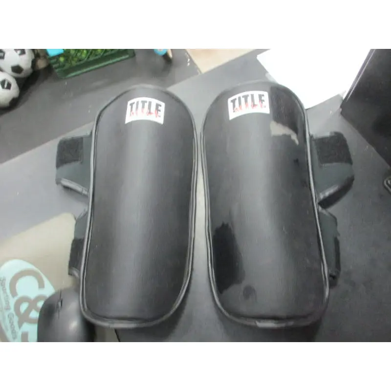Used Title MMA Shin Guards Size Medium (Has slight wear on shin)