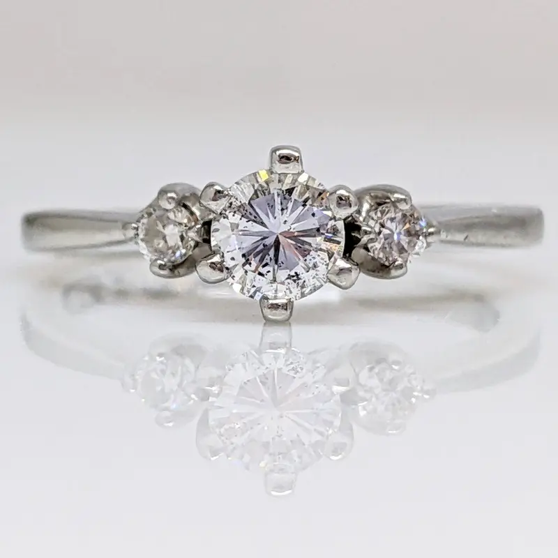 PLATINUM .48 CARAT TOTAL WEIGHT I1 H DIAMOND ROUND (3) ESTATE TRINITY RING 4.5 GRAMS
